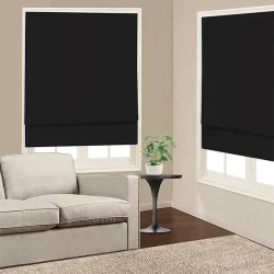 Blackout blinds of black fabric limiting the sunlight inside the room