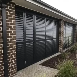 Black garage door with roller shutters
