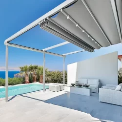 A patio with a retractable awning providing shade and protection from the elements