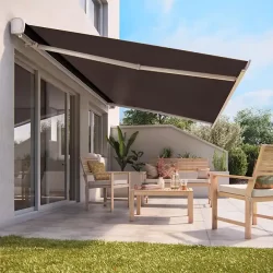 Patio with table and chairs under an awning, featuring Straight Drop Crank Blinds for shade and privacy