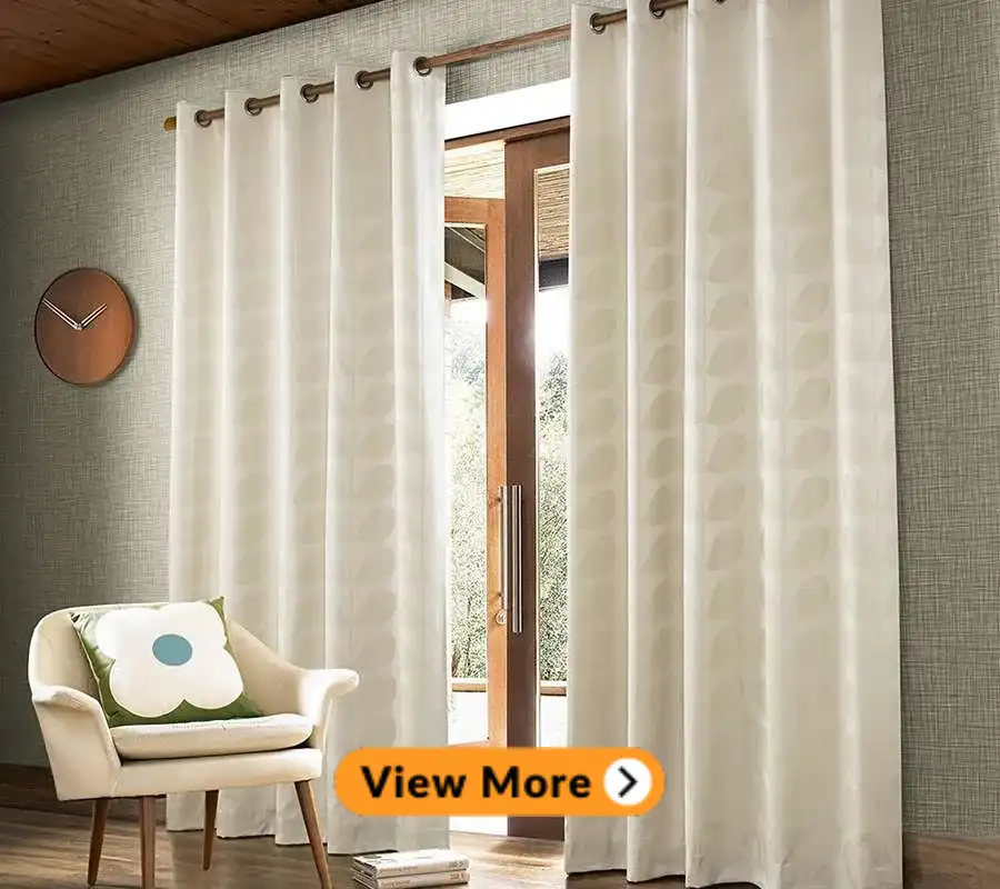 white eyelet curtain in a room