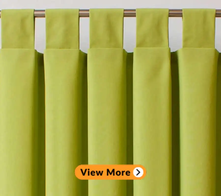 green fabric of a tab top curtain